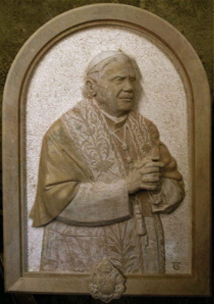 Stone relief of Pope Benedict XVI in Altötting, carved by sculptress Sabine Thalhammer